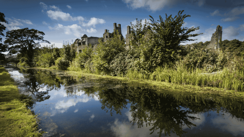 A picture of the ruins of an abbey in Neath, the 7th best property investment hostpot in 2026.